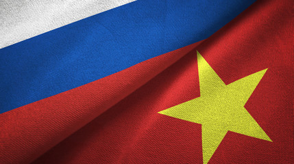 Russia and Vietnam two flags textile cloth, fabric texture