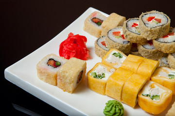 Hot fried Sushi Roll with with vegetables. Set sushi menu.
