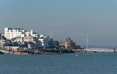 Fototapeta premium Cowes, Isle of Wight, UK, February 2019.The Royal Yacht Squadron building located on the westbank of River Medina estuary. Famous yachting centre.