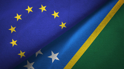 European Union and Solomon Islands two flags textile cloth, fabric texture