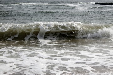 strong foamy sea waves