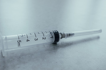 A 5 ml syringe on a white background. Medical equipment for subcutaneous and intramuscular...