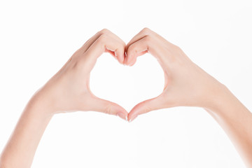 isolated background showing woman hands making a heart for saint valentines day