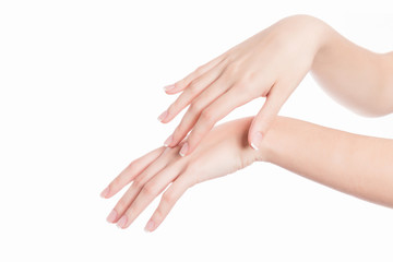 isolated background showing woman hands applying beauty care soft product