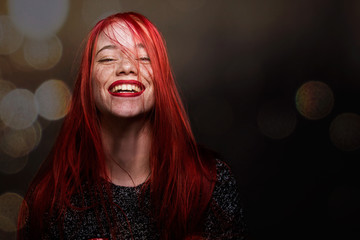 Beautiful natural freckle young girl with long red hair close up portrait 