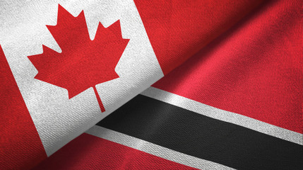 Fototapeta na wymiar Canada and Trinidad and Tobago two flags textile cloth, fabric texture