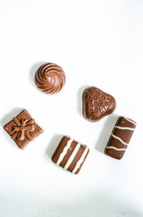 chocolates on white background