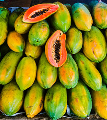 healthy fresh Asian papaya exposed in local market with spectacular color