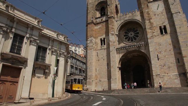 MS Tram in front of historic cathedral / Lisbon, Portugal