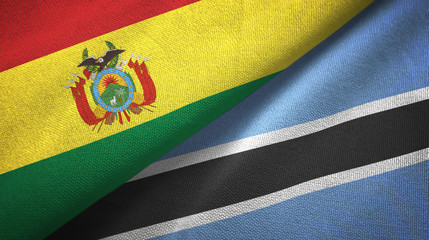 Fototapeta premium Bolivia and Botswana two flags textile cloth, fabric texture