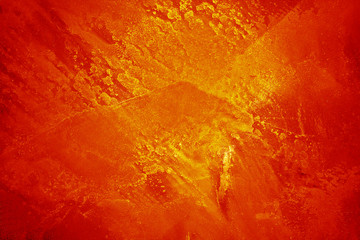 abstract golden grunge background. The texture of the wall of decorative plaster.