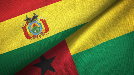 Fototapeta premium Bolivia and Guinea-Bissau two flags textile cloth, fabric texture