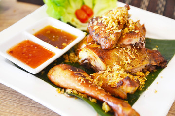 close up of grilled chicken with thai chili sauce