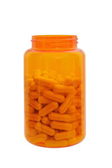 orange plastic medical small bottle filled with capsules without cover on a white background