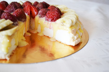 cake with cream and strawberries