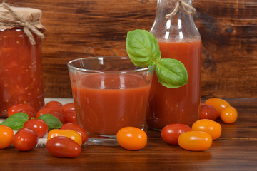 fresh tomato juice with basil in a glass