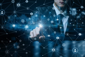 A businesswoman operating with networking connections structure.