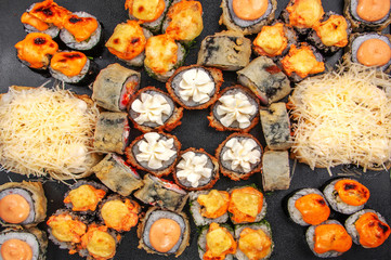 close up of sashimi sushi set, roll with delicious cream
