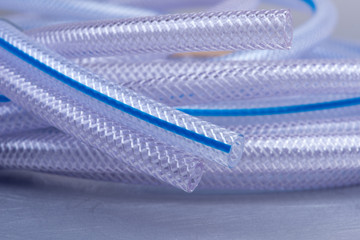 Flexible transparent hose pipe close-up