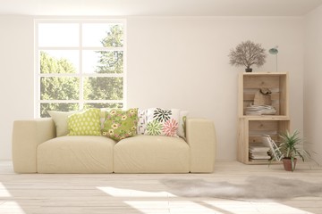 Fototapeta na wymiar White stylish minimalist room with sofa and summer landscape in window. Scandinavian interior design. 3D illustration