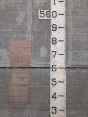 Numbers Etched on Concrete Wall