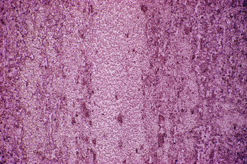 abstract colorful grunge background. The texture of the wall of decorative stucco. modern and fashionable clothes for walls