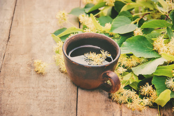 linden tea and flowers. Selective focus. drink.