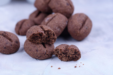 Delicious and fragrant coffee in the form of coffee, with coffee beans, and small coffee cups