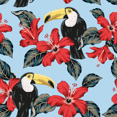 Toucans, red hibiscus flowers, leaves, blue background. Vector floral seamless pattern. Tropical illustration. Exotic plants, birds. Summer beach design. Paradise nature