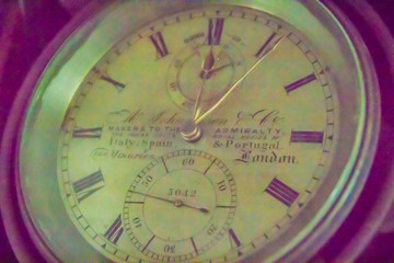 Fototapeta premium Vintage old marine chronometer, a timepiece that is precise and accurate enough to be used as a portable time standard; it can therefore be used to determine longitude by means of celestial navigation