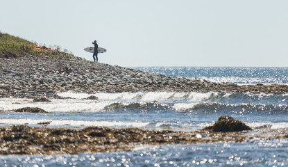Surfer Emerging from Ocean © Susan