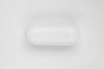 Medical pill tablet on white, clipping path included