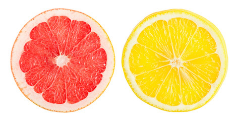 Two slices orange and grapefruit isolated on white