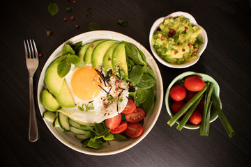 Diet meal with egg and avocado salad. Vegetarian bowl. Healthy lunch or breakfast. Top view,