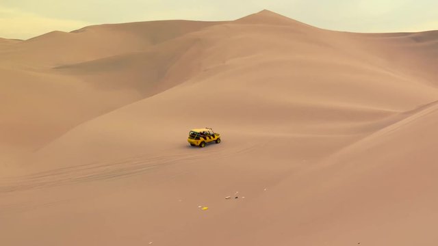 Shot of a dune buggy on Huacachina desert in Ica Region of Peru, South America.