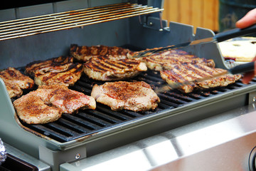 Cooking beef barbecue delicious steaks close up photo