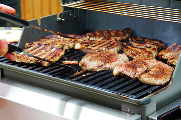 Cooking beef barbecue delicious steaks close up photo