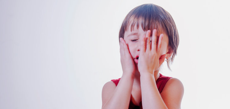 Little Child Girl Screaming Internally From Boredom. Cute Emotive Caucasian Female Kid Rolling Eyes From Annoyance And Hearing Nonsense.