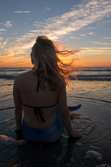Fototapeta premium Beached Mermaid at Sunrise, St Simons Island, Georgia