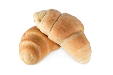 two croissants on top of each other isolated on white background