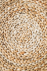 Wicker straw texture. Round traditional handmade rattan pattern.