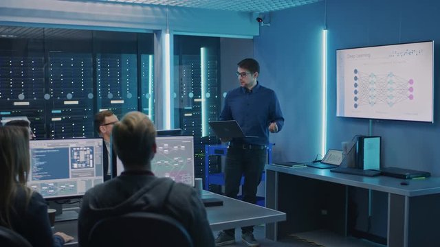 Team of Professional IT Developers Have Meeting, Speaker Talks about New Blockchain Based Software Development Shown on TV. Concept: Deep Learning, Artificial Intelligence, Data Mining, Neural Network