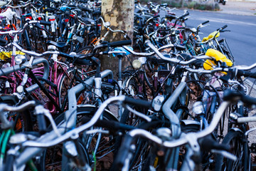 Big bicycle parking with lot of bicycles. Sport concept with bicycle. Pile of bikes in the street