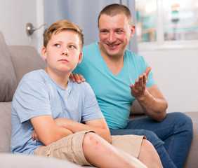 Father is wanting talking with his son after conflict