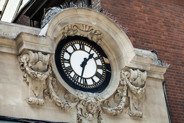 Big clock on the building. Time concept with clock