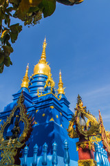 Fototapeta premium Beautiful blue pagoda at Wat Rong Suea Ten Temple, also known as the Blue Temple. Wat Rong Suea Ten or the Tiger Temple is locate at Chiang Rai province, northern part of Thailand.