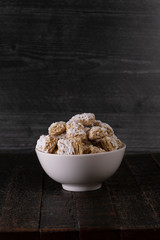 White Bowl of Breakfast Cereal on a Wooden Table