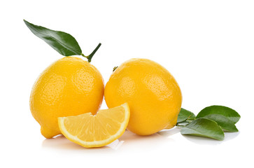 Lemon with green leves isolated on white background