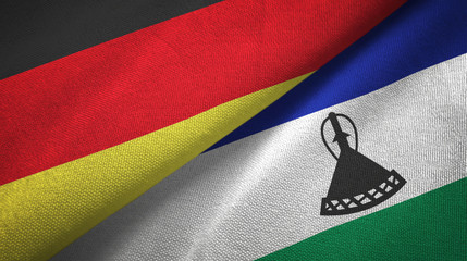 Germany and Lesotho two flags textile cloth, fabric texture