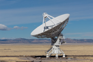 Very Large Array radio astronomy observatory dish, engineering science technology, blue sky,...